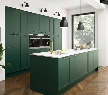 dark green kitchen cabinets with golden handles white countertop modern interior design trends 2023