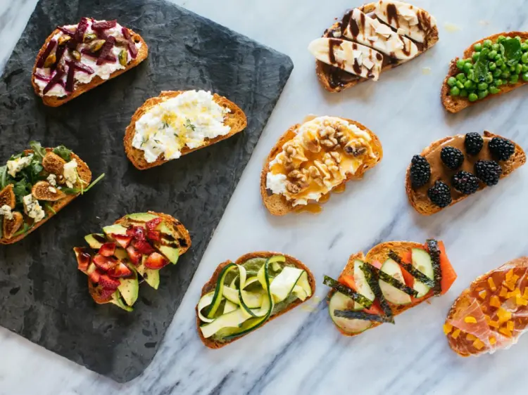 delicious crostini with different toppings sweet and salty