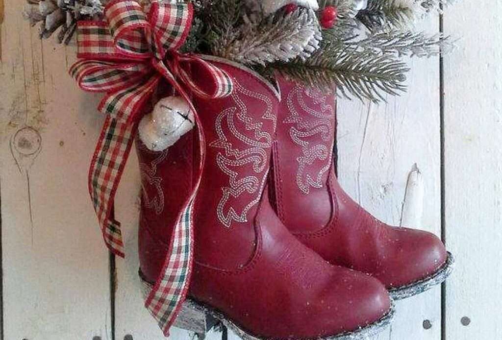 diy christmas boots decoration ideas old red boots full of greenery hung on door