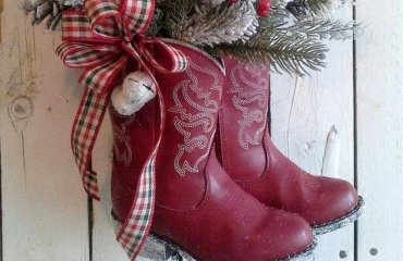 diy christmas boots decoration ideas old red boots full of greenery hung on door