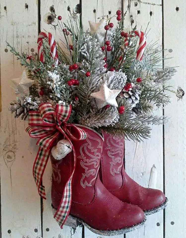 diy christmas boots decoration ideas old red boots full of greenery hung on door