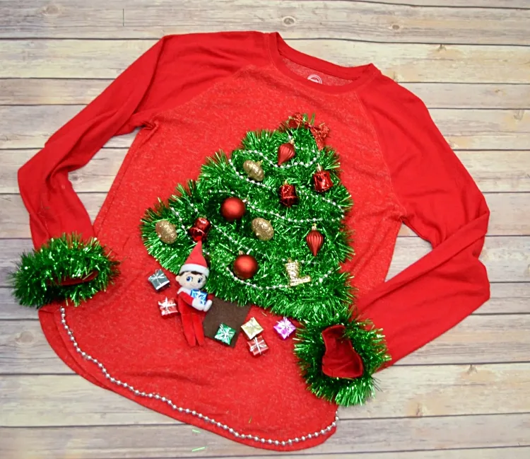  tinsel garlands tree on a red blouse small tree ornaments decorations
