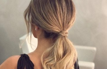 elegant low ponytail blonde long wavy hair modern look hairstyles 2023