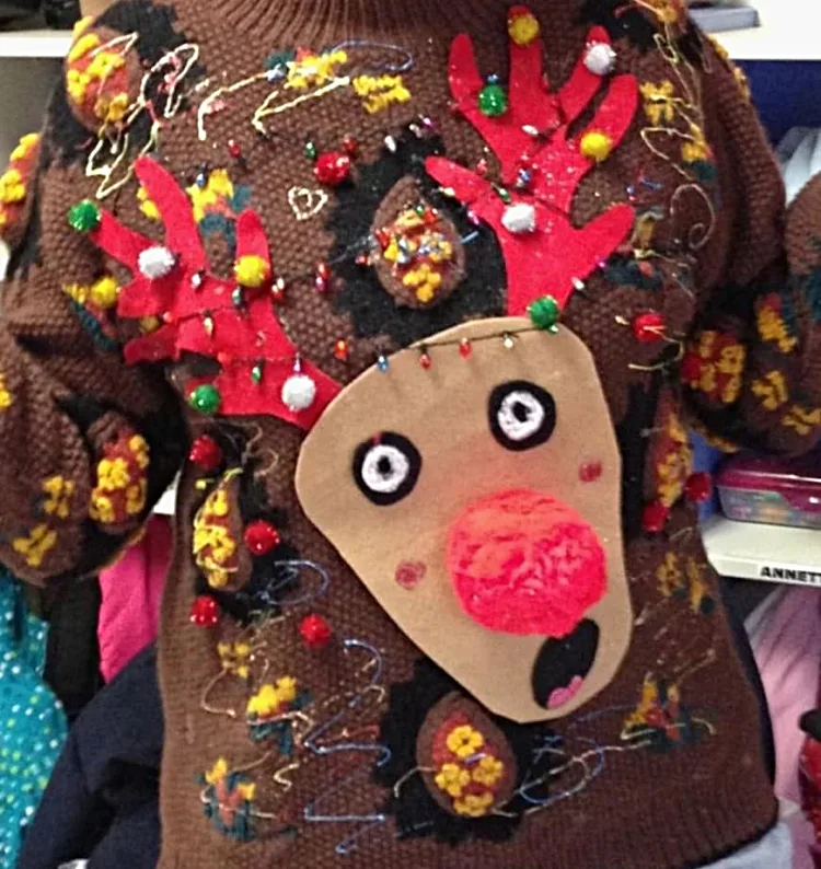 extremely ugly christmas sweater creepy deer pom poms garlands brown sweater