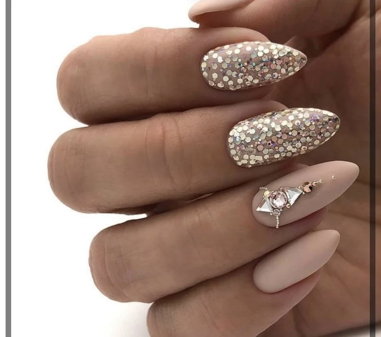 glitter and rhinestones nude shades glitter manicure idea 2022 gold