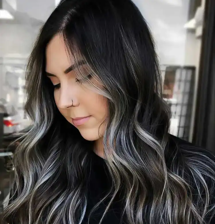 gorgeous idea for silver highlights on long black wavy hair modern look