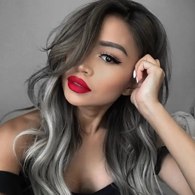 modern look black roots ombre technique long wavy hair