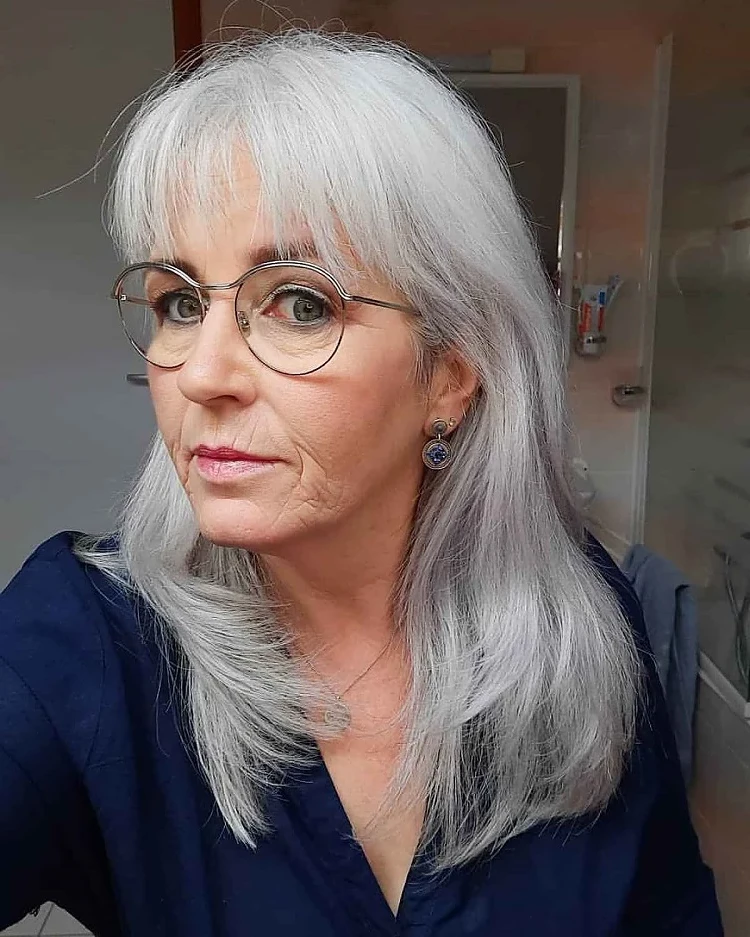 hairstyles with bangs 60 year old women with oval face