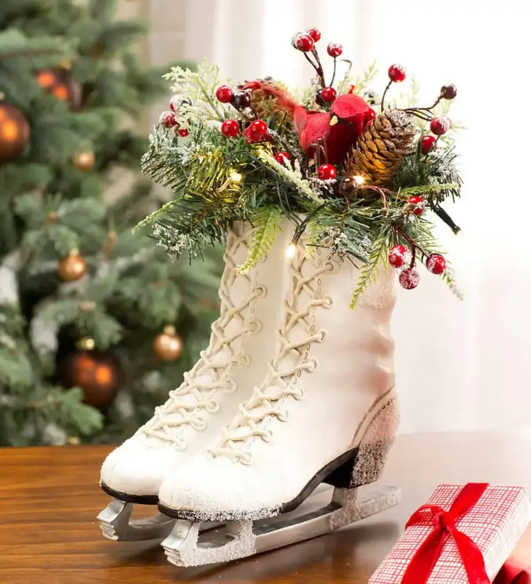 homemade outdoor christmas decoration white ice skates greenery red ornaments