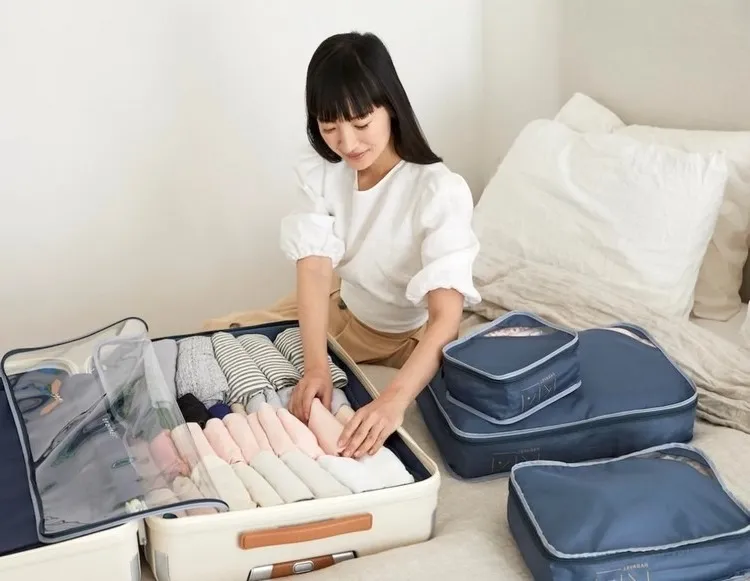 how to pack your suitcase according to the marie kondo method in 10 minutes