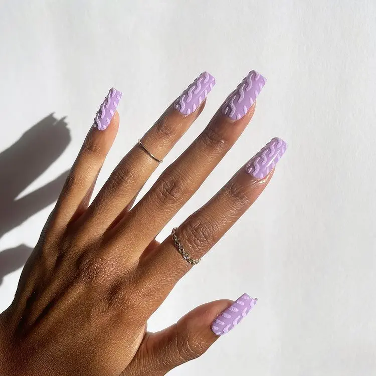 long coffin nails purple color manicure for new years eve embossed art