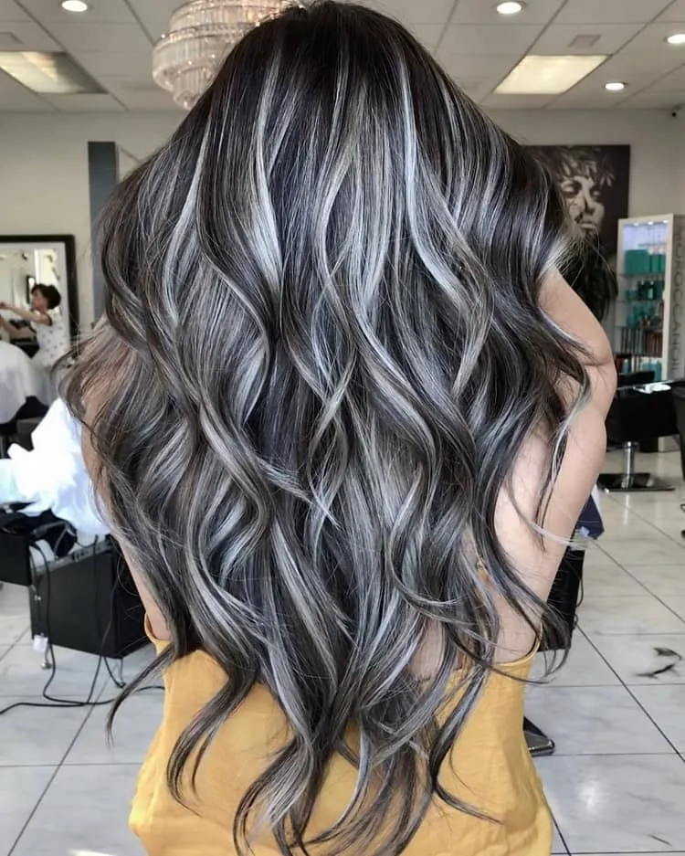 long dark waves with silver highlights-silver hairstyles