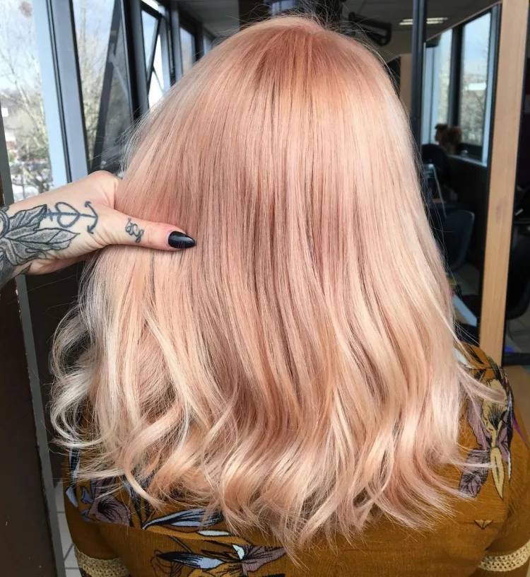 pastel peachy blonde hair color medium length coloring trends 2023