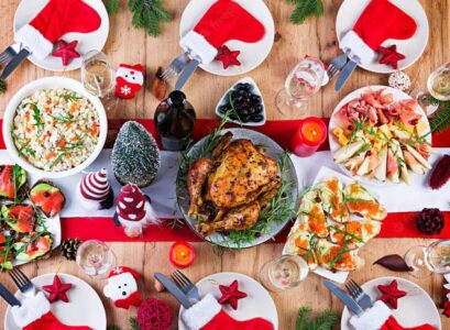 roast turkey side dishes christmas dinner table decorated tinsel candles