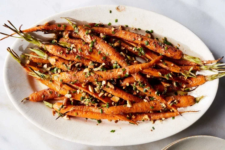 Christmas side dishes roasted carrots with spices and almonds