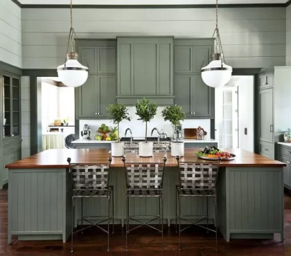 sage green kitchen interior design cabinets wood countertop iron chairs trendy in 2023