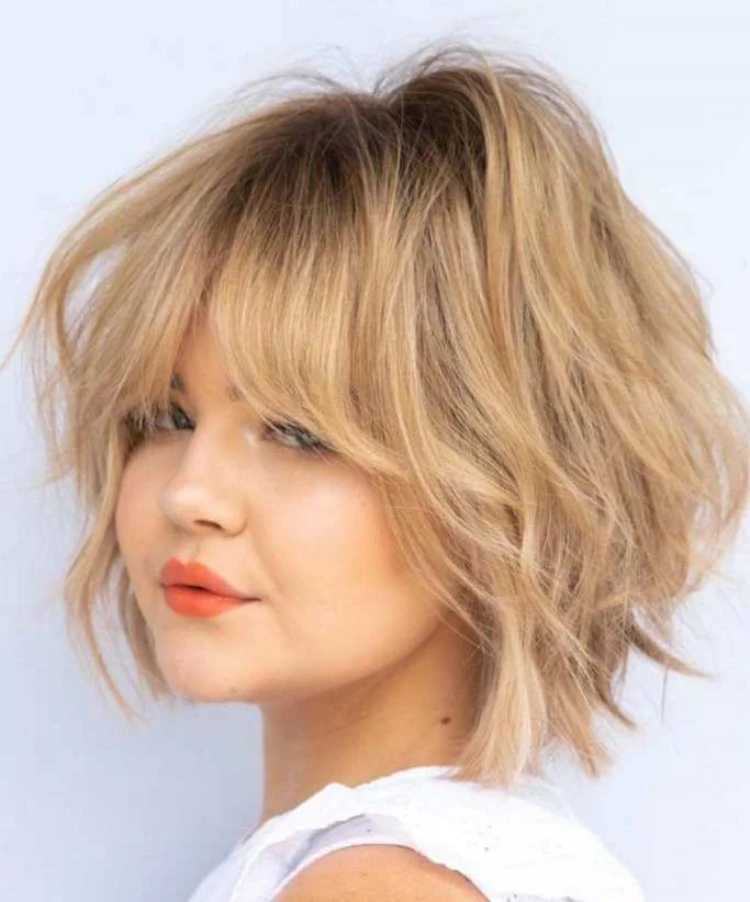 short blond hair layered hairstyle curtain bangs