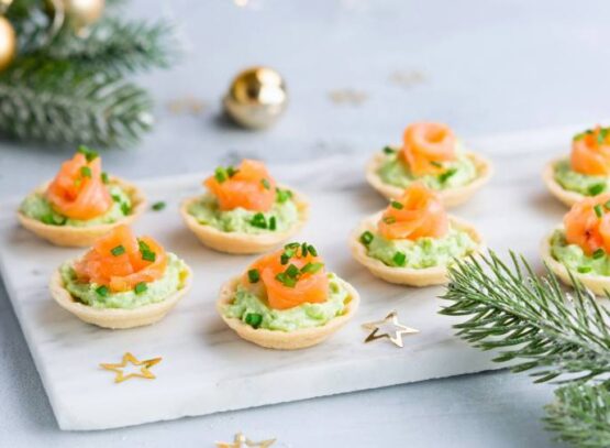tartlets with avocado sauce with fresh dill lemon juice smoked sliced salmon puff pastry shells appetizers for New Year's party