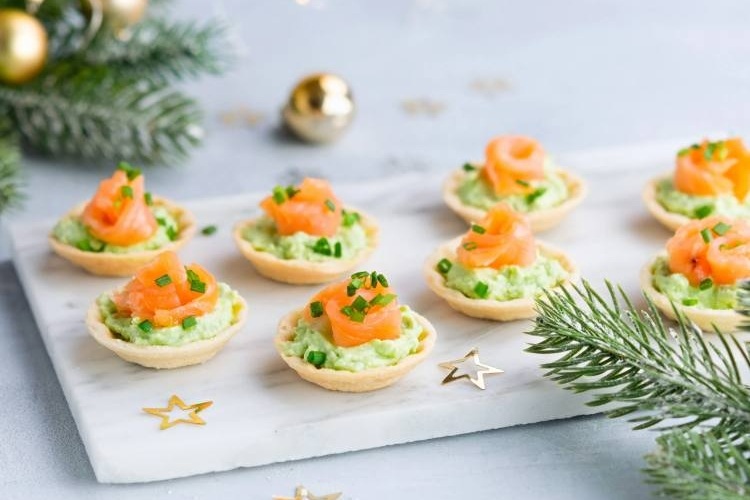 tartlets with avocado sauce with fresh dill lemon juice smoked sliced salmon puff pastry shells appetizers for New Year's party