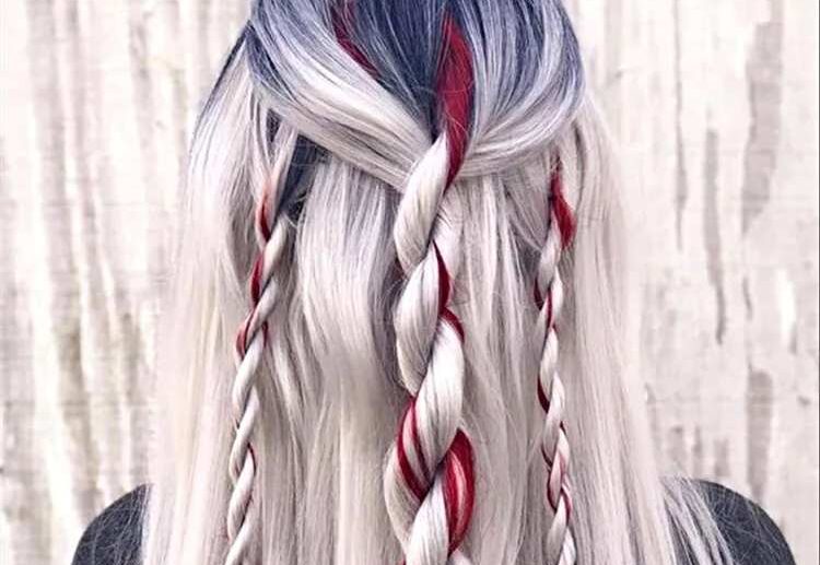 trendy 2022 christmas hairstyle for her long ash blonde hair with red highlights