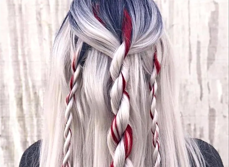 trendy 2022 christmas hairstyle for her long ash blonde hair with red highlights