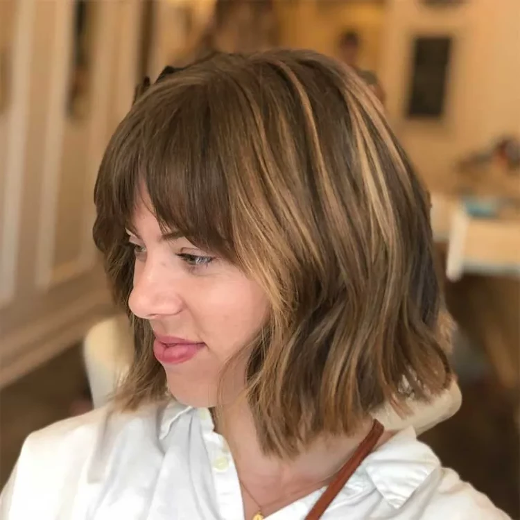 wavy bob with curtain bangs for women 40 years 50 years