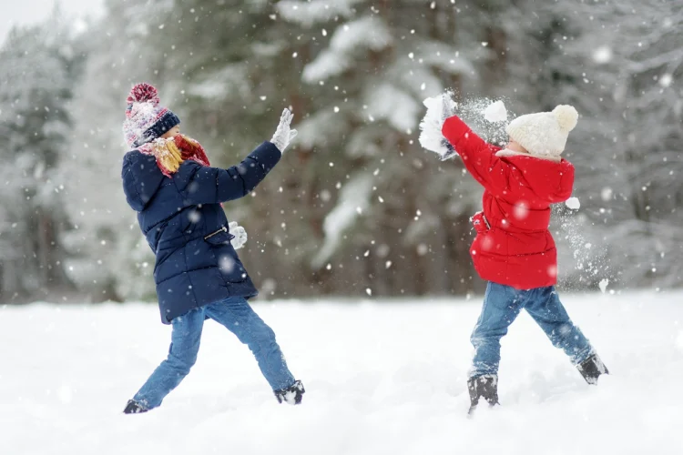 winter activities for kids snowball fight having fun in the snow