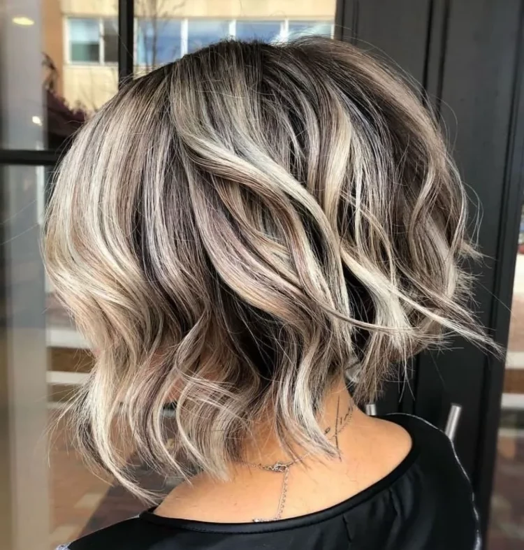 How to wear a stacked inverted bob at 50 blonde balayage