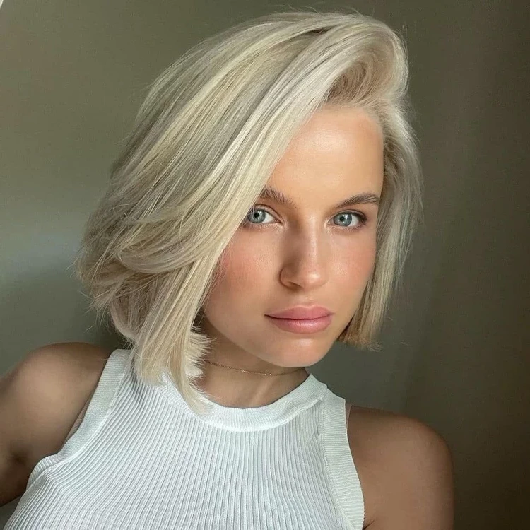 Scandi bob blonde style with side parting