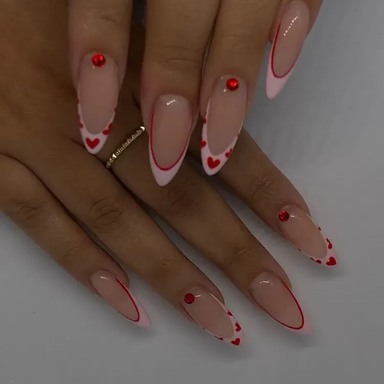 Valentine's day trendy manicure 2023 red hearts pink tips