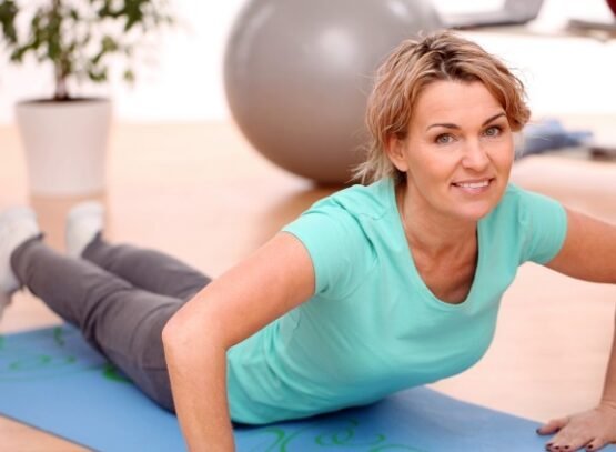 ab exercises for women over 50 woman doing sports smiling