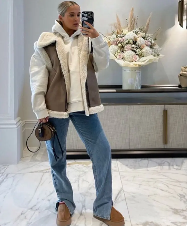 are uggs still in style 2023 how to wear them bella hadid way fashion inspiration outfit jeans aviator jacket