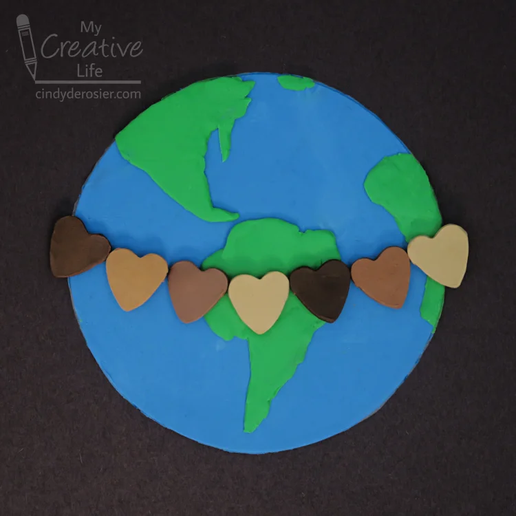 clay art colorful hearts symbolizing peace and equality