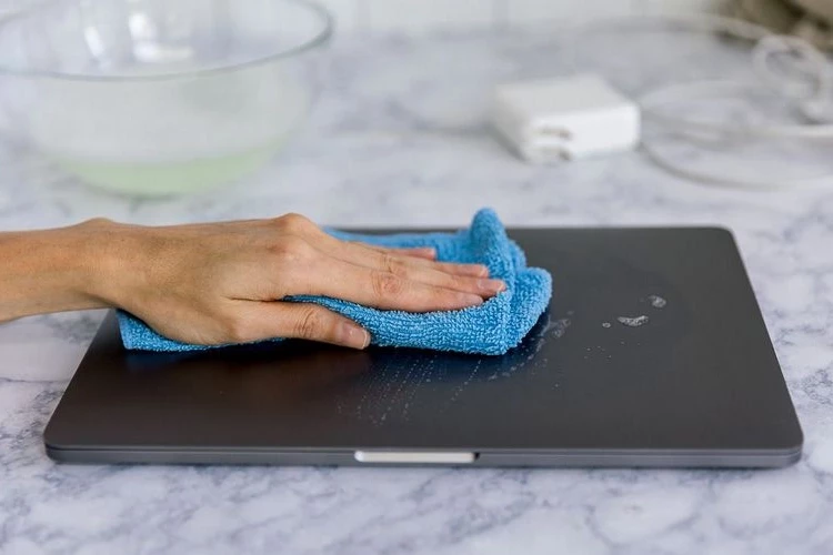 clean the case and touchpad of your laptop