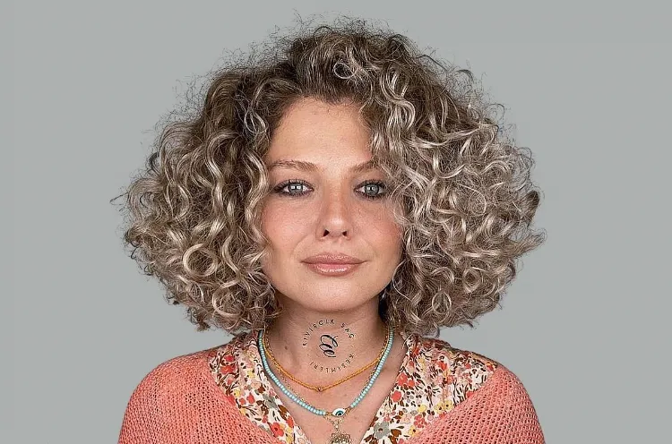curly bob hairstyle women 40 50 years layered bob