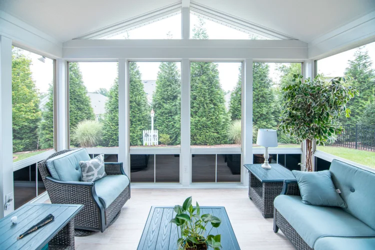 glass enclosure blue furniture outdoor living space