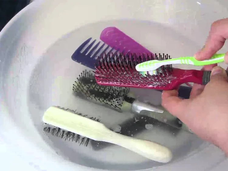 how often should you clean your hair brush in a water solution