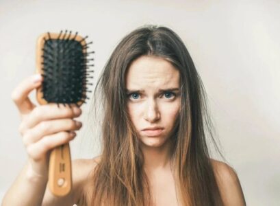 how to clean hair brushes why it is important girl frowning