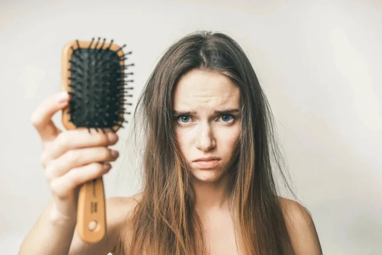 how to clean hair brushes why it is important girl frowning