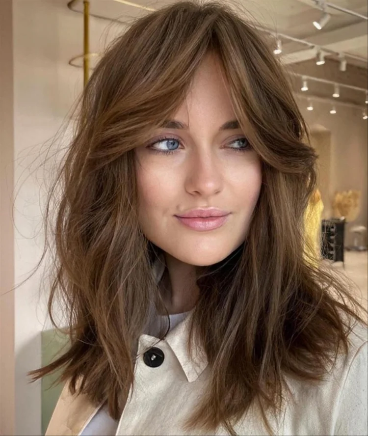 Are Bangs In Style In 2023 Find Out All About The Trends In Hairstyles   Long Curtain Bangs Medium Length Hair.webp