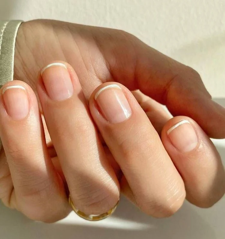 micro French nails fashion trends in 2023 gentle manicure