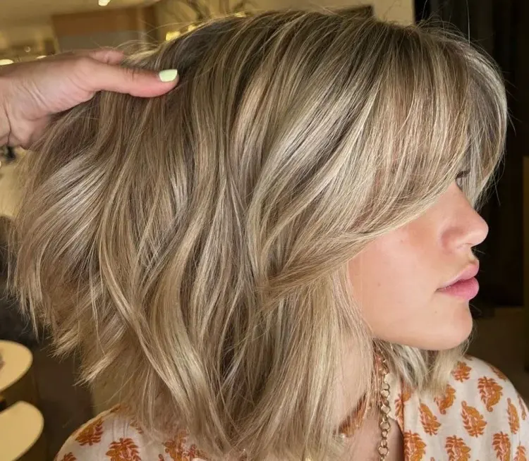 mid-length platinum blonde hair bob hairstyles with curtain bangs