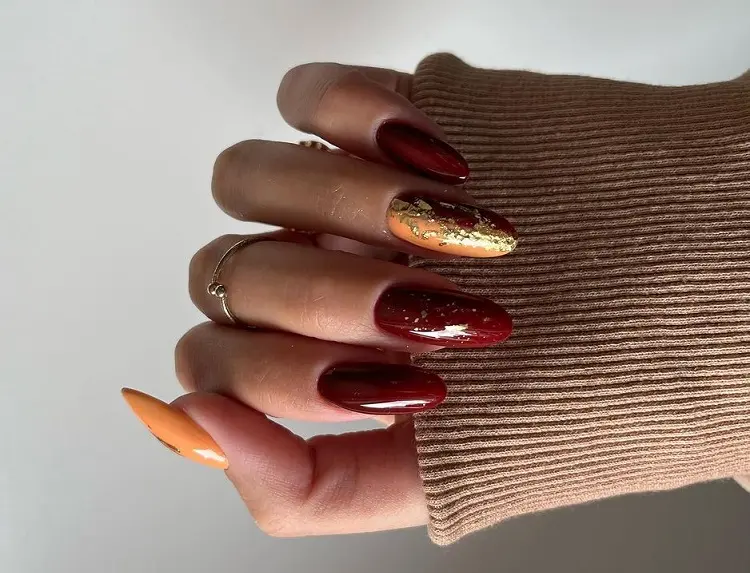 red and orange golden foil nail design 2023 what is trendy for nails