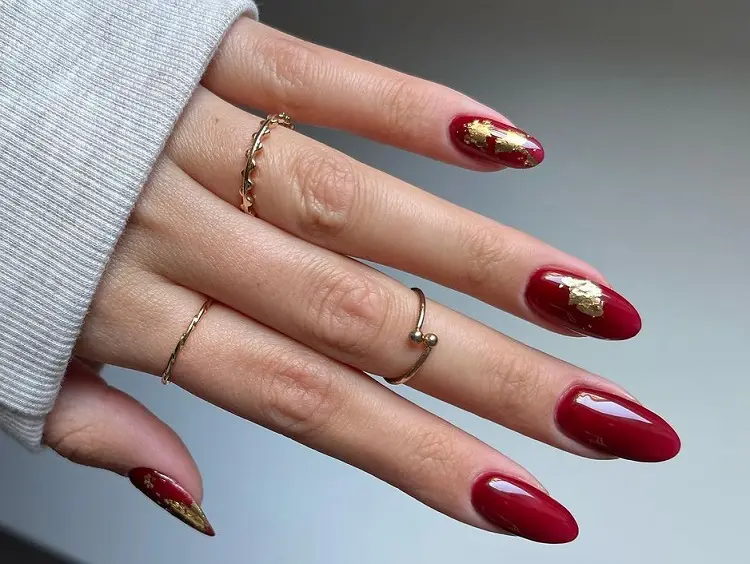 red nails theory with gold foil simple design and art
