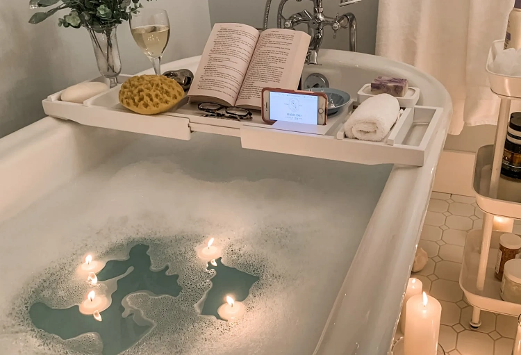relaxing bath candles book smartphone cozy vibes