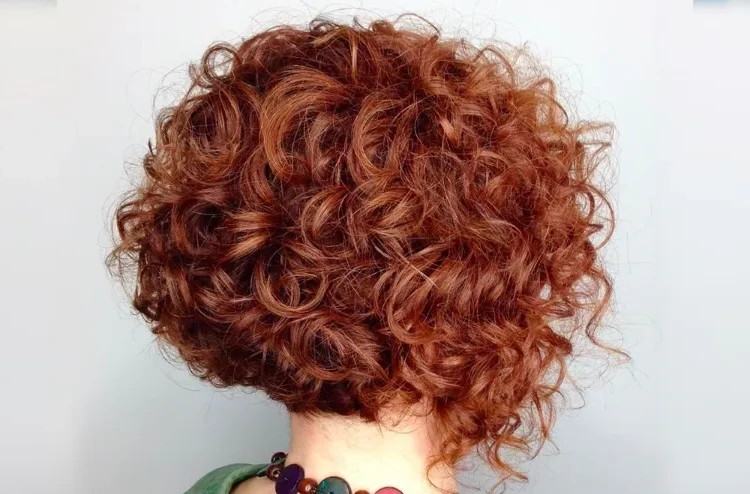short curly bob women 50 year old copper hair color
