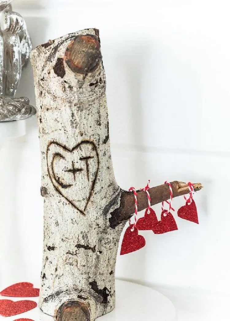 tree log with initials hearts valentines day decoration idea 2023