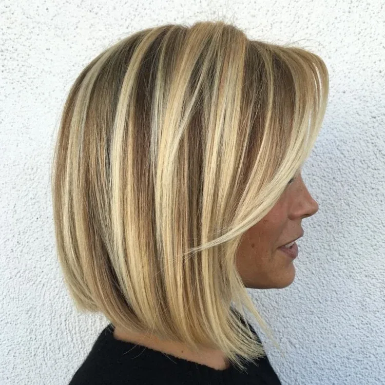 trendy bob hairstyle with long side swept bangs