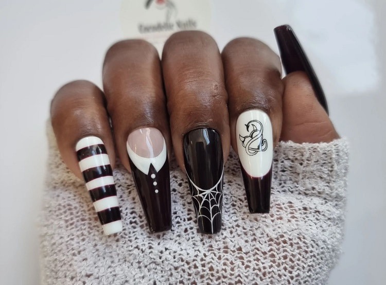 1. "Wednesday Addams inspired nail design" - wide 8