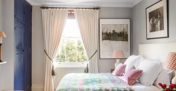 window treatment like curtains or drapes in the bedroom creates a cozy atmosphere